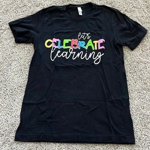 Celebrate learning with this teacher t-shirt